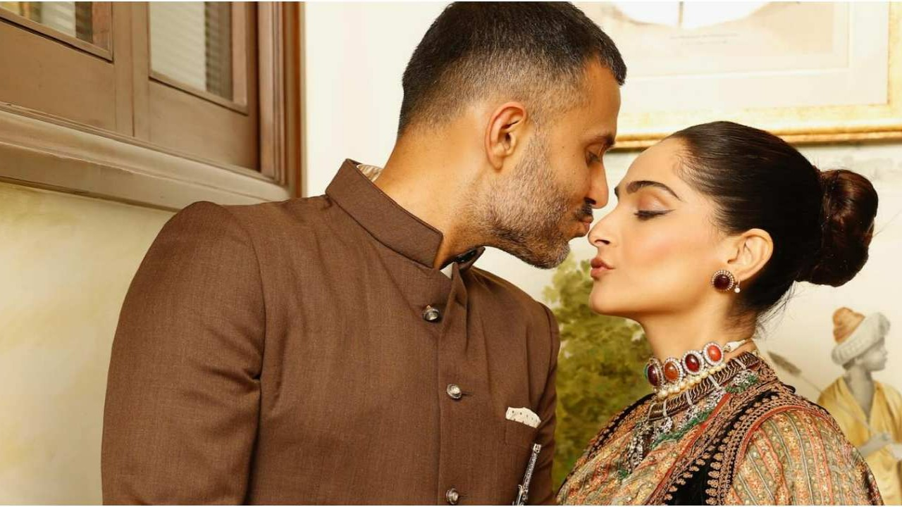 Sonam Kapoor showcases a distinctive saree styling in recent photos with her stylish companion Anand Ahuja.